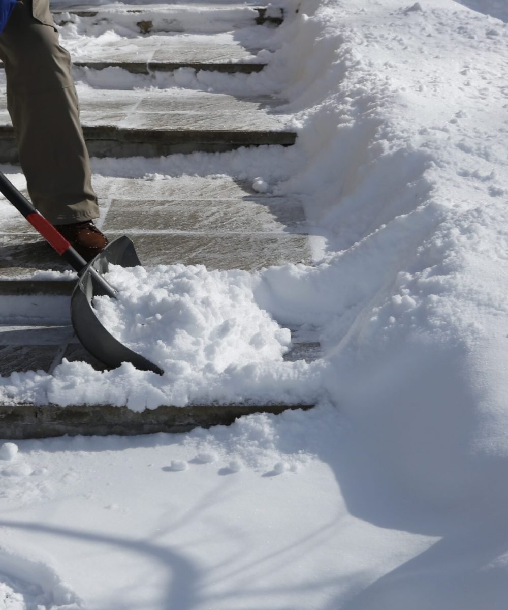 imgi_166_person-shovels-snow